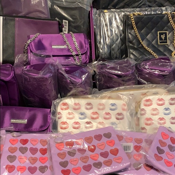 Younique Handbags - Buy 1 get 1 FREE Younique  Cosmetic bags
